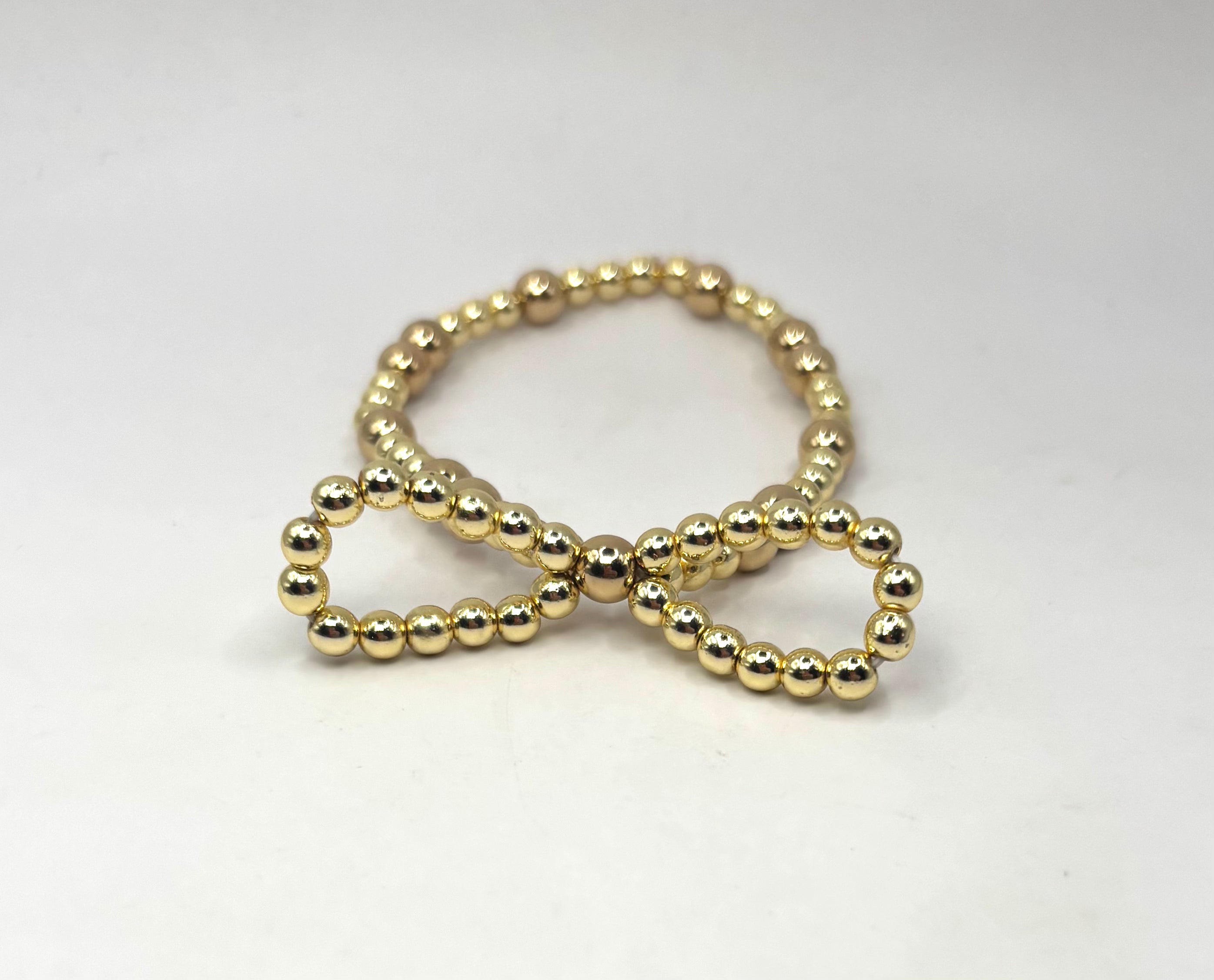 Gold stackable bow bracelet